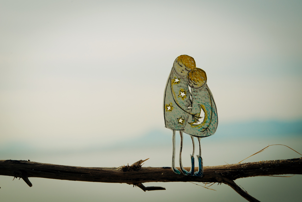 Two people snuggle up